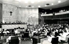 Ato na Câmara Municipal de São Paulo em homenagem ao Padre Ramim assasinado em junho de 1985 (São Paulo-SP, 10 dez. 1985) [fotografia] / Fotógrafo(a) : Regina Vilela. -- Ref.: BR-SPMST_MST-SN-CIN_AMP_000364-001752-AMT.